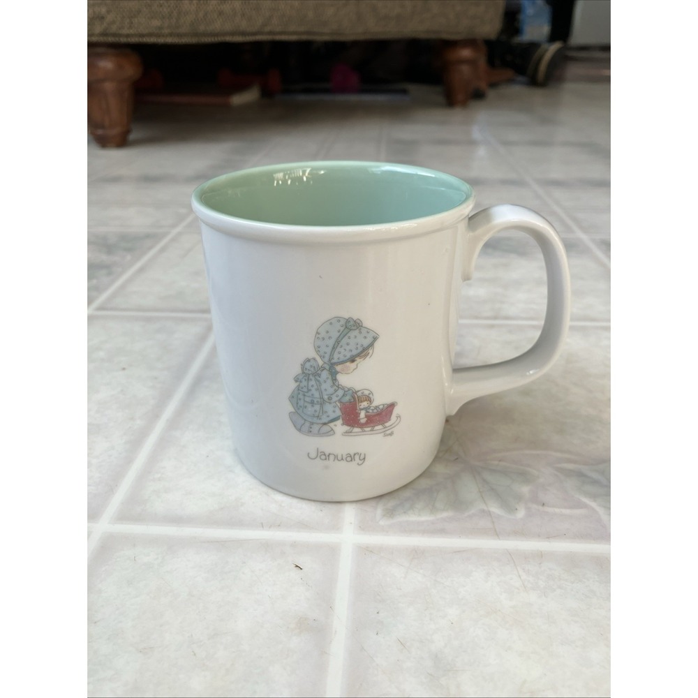1987 Precious Moments Enesco Mug January Girl w/ doll in Buggy Sled‎ mint inside